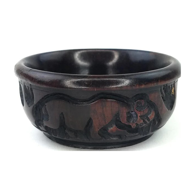 Medium-sized handcrafted ebony wood bowl, perfect for serving, storage, or decorative use, made by skilled artisans.