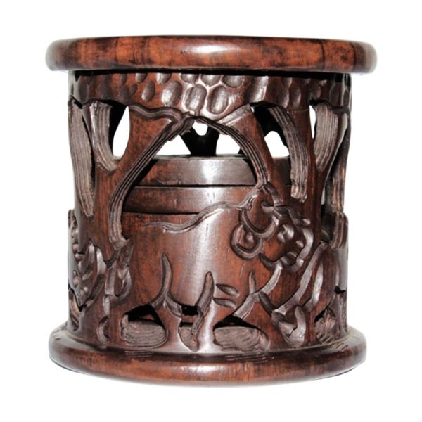 Set of handcrafted ebony wood coasters, stylish and durable for home décor and table protection.